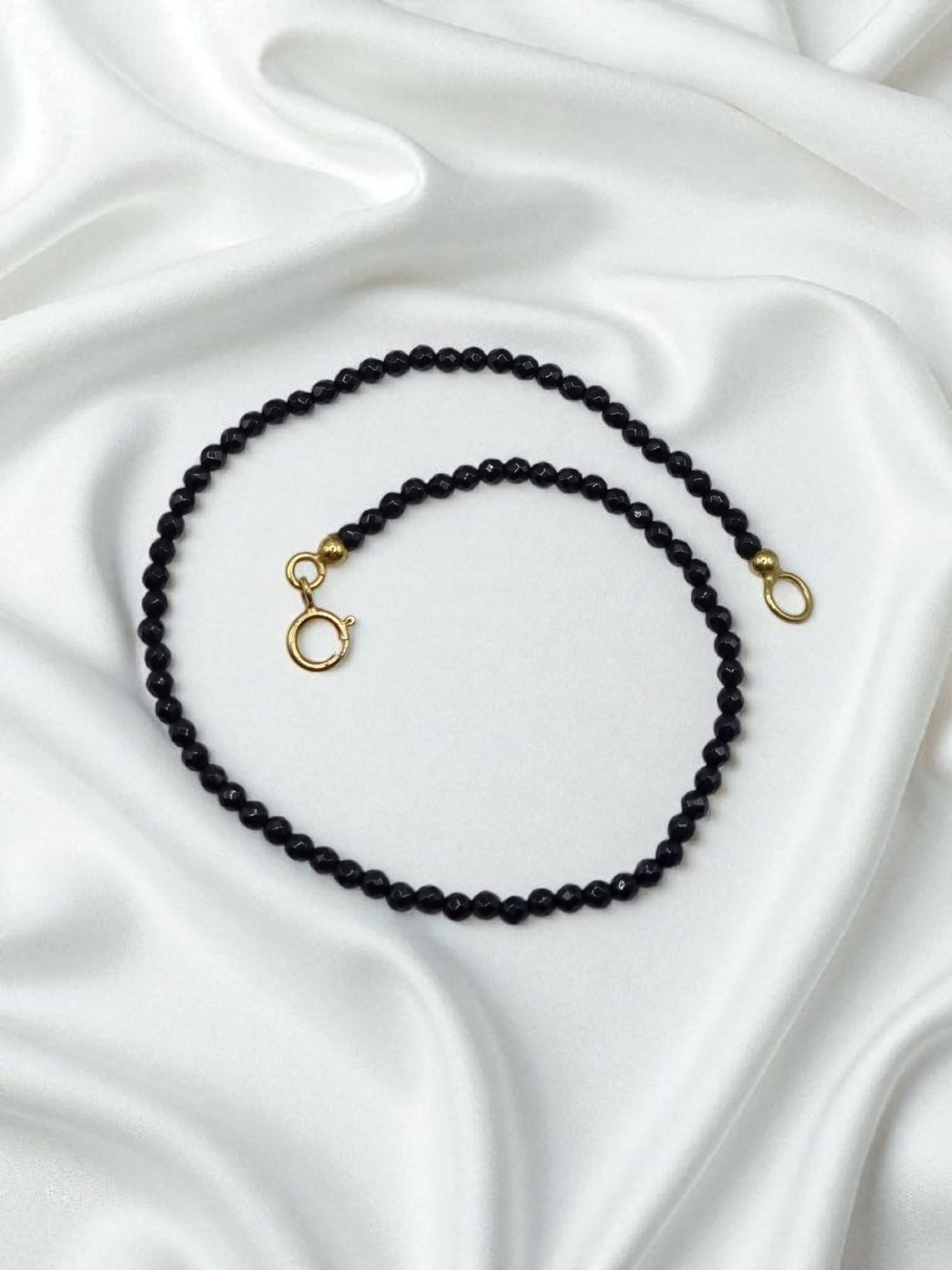 Armband schwarzer Spinell facettiert in 925 Sterling Silber vergoldet