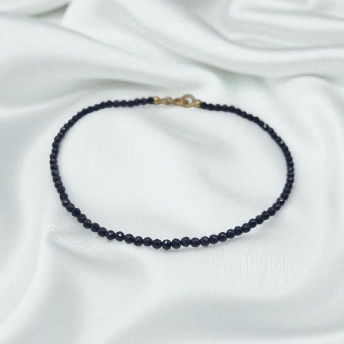Armband schwarzer Spinell facettiert in 925 Sterling Silber vergoldet