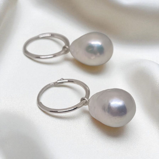 Hoop earrings in 925 Sterling silver with real freshwater baroque pearl drops