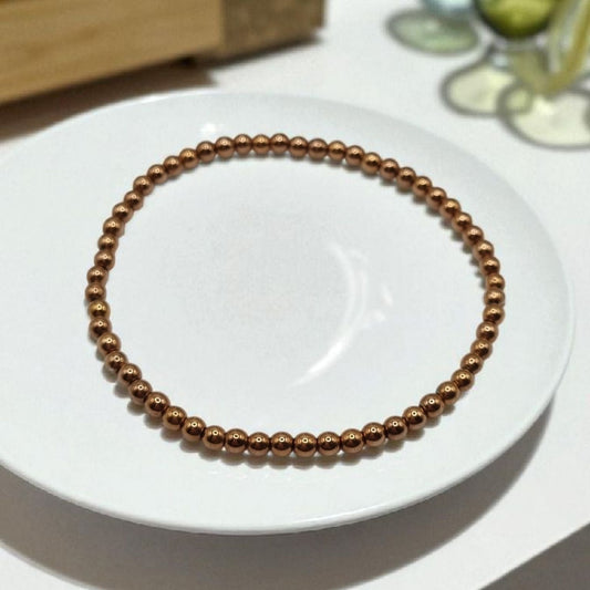Kugel Armband 3mm Hämatit Rotgold farben beschichtet stretch