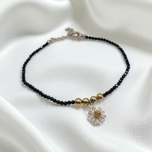 Armband aus schwarzem Spinell mit tw. vergoldeter Blume und Kugeln in 925 Sterling Silber