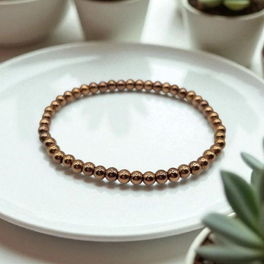 Kugel Armband 4mm Hämatit Rotgold farben beschichtet elastisch